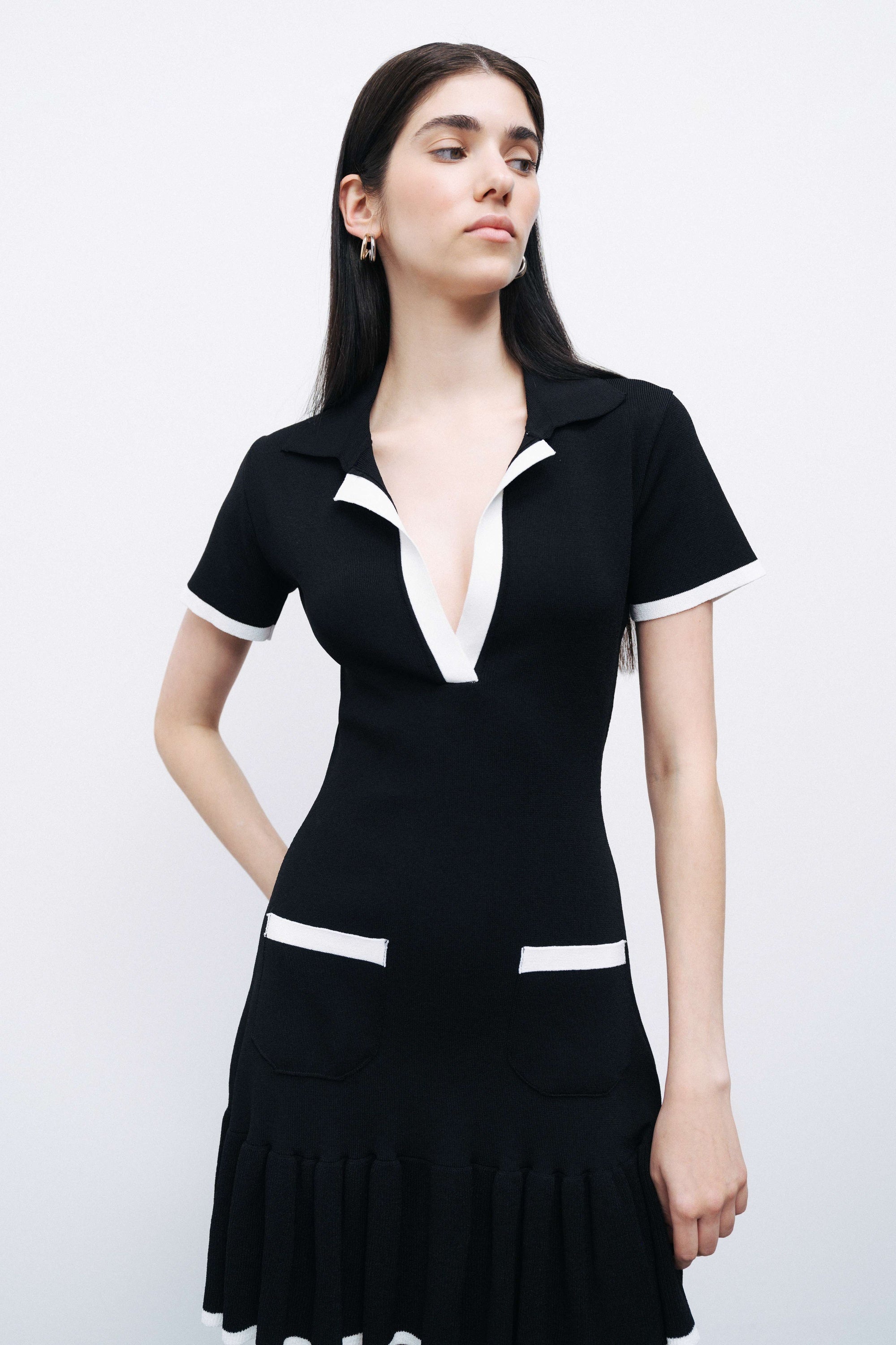 Black Pleated Hem Knit Mini Dress