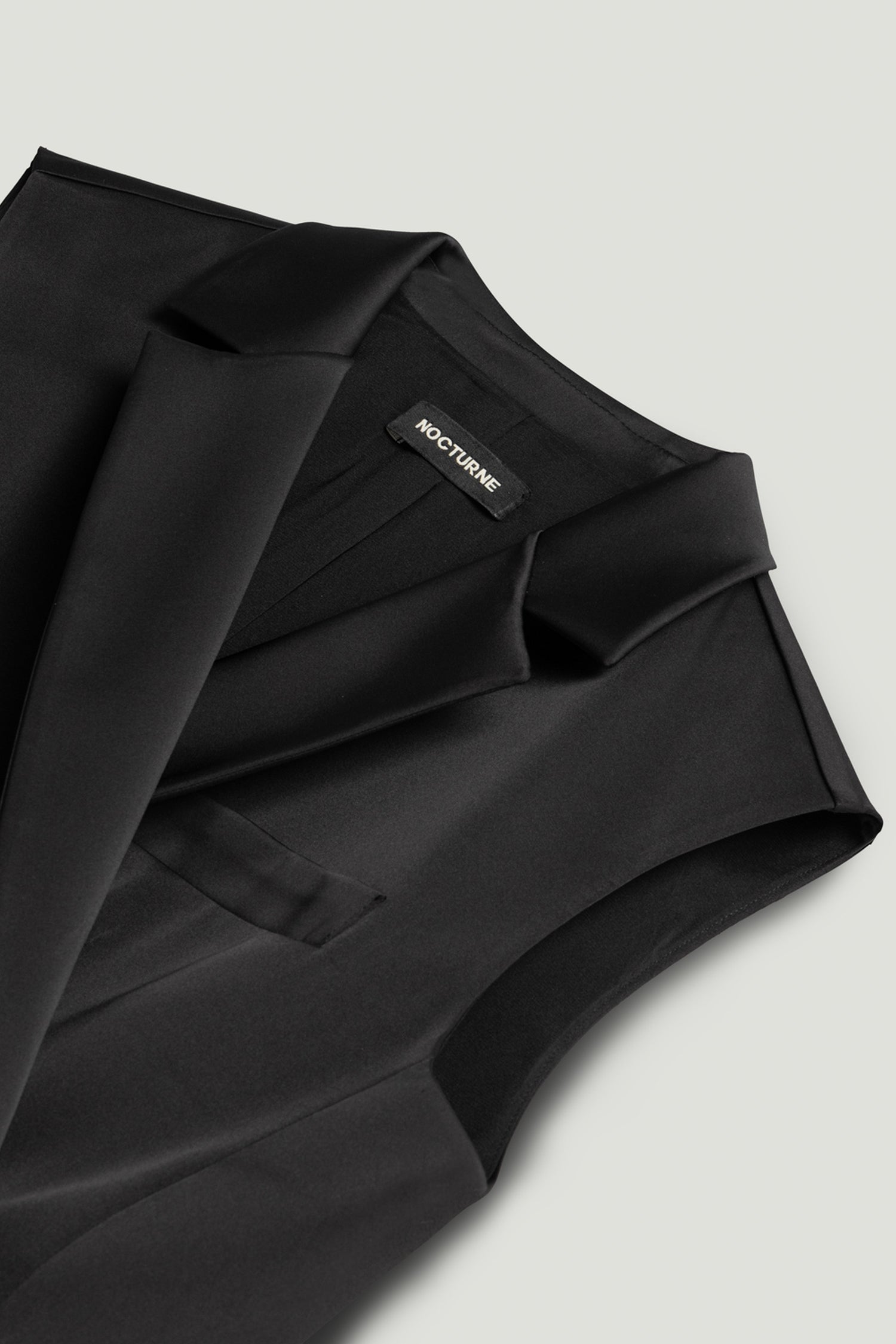 Asymmetric Buttoned Longline Vest